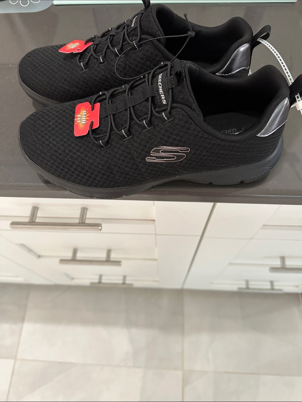 New never worn Skechers Black Mesh slip in memory foam Comfort Sneakers